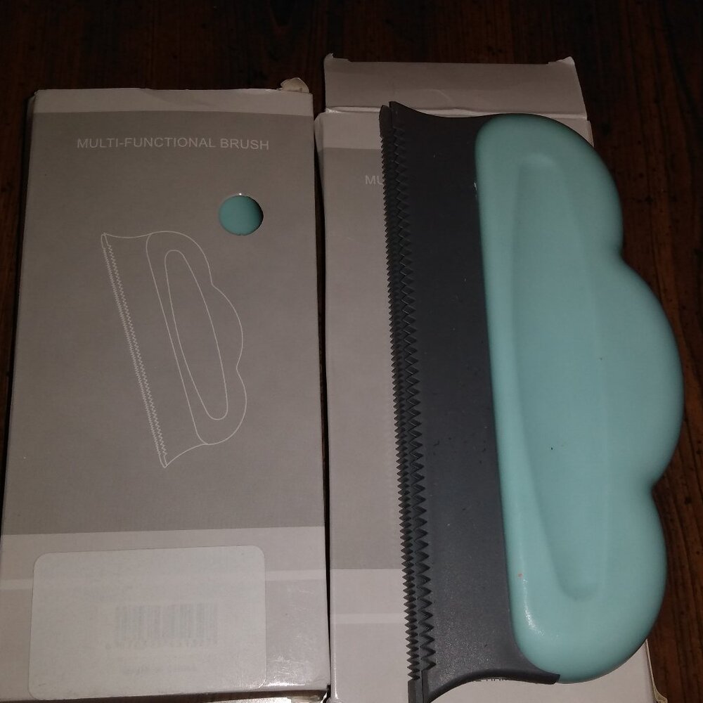 Lt blue Pet hair removal brush multifunctional